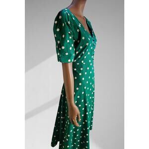 Polka dot green midi dress with puffy sleeves size L ties in the back